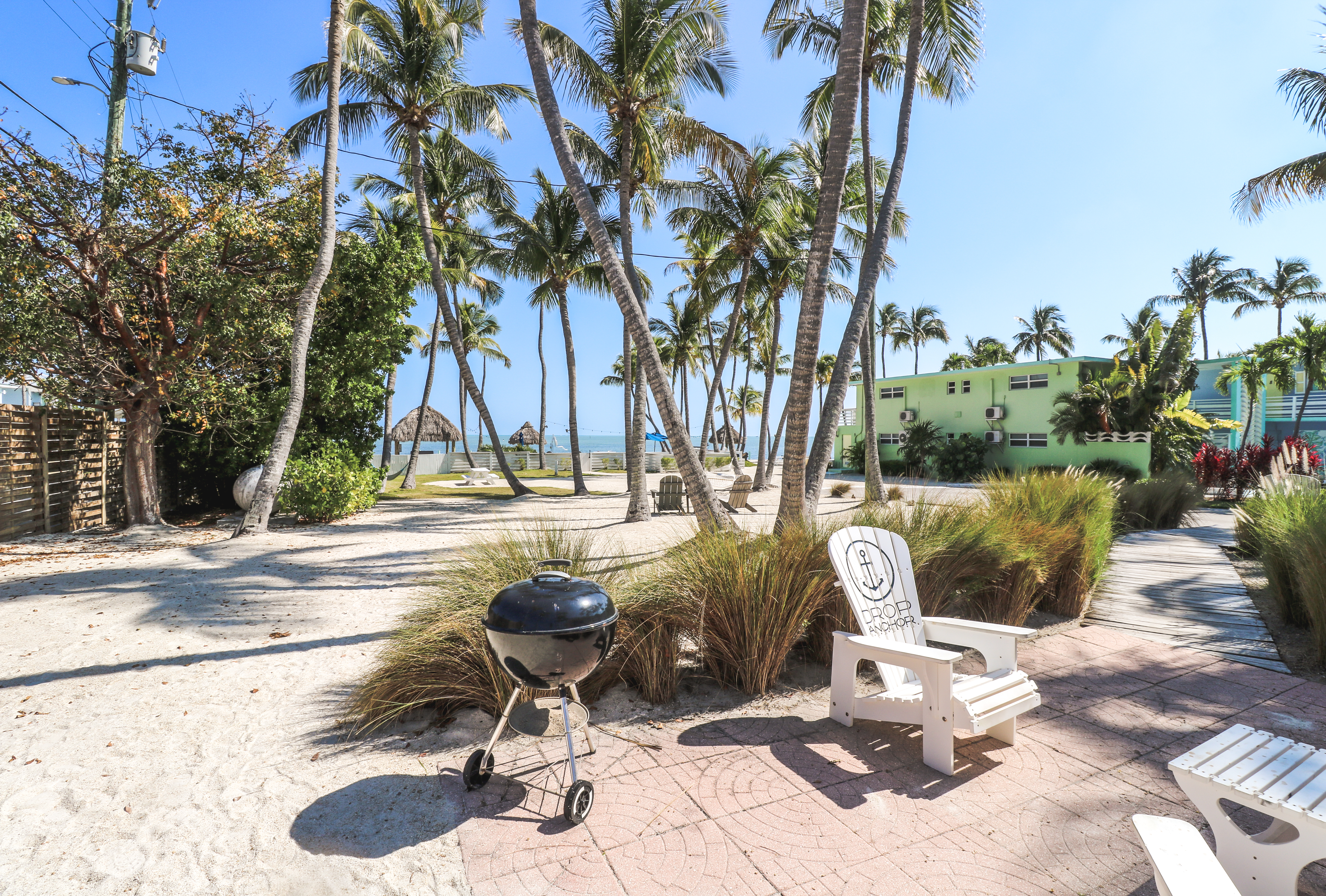a blurry photo of a beachside grill and chair